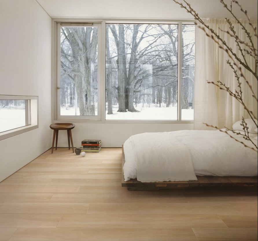 Bedroom with wood effect porcelain stoneware tiles by Caesar